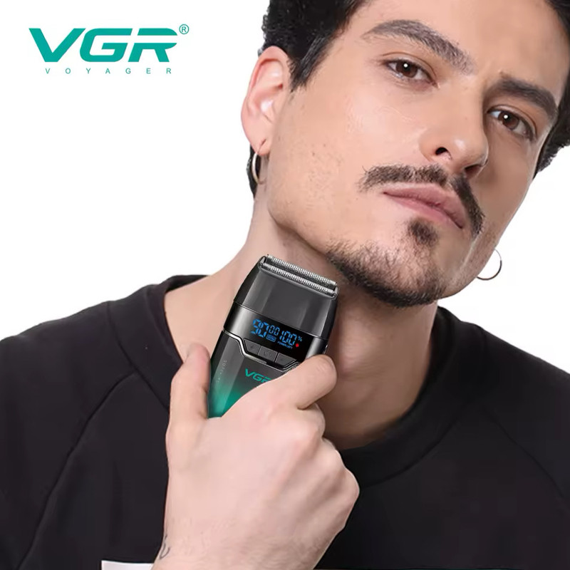ماشین اصلاح موی صورت وی جی ار مدل V-308 با تیغه تیتانیوم پیشرفته، باتری لیتیوم یونی 1200 میلیآمپرساعتی، قابلیت اصلاح خشک و مرطوب، نمایشگر وضعیت باتری و طراحی ارگونومیک مقاوم در برابر ضربه
