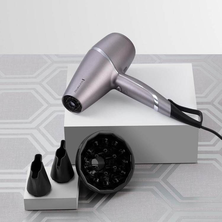 سشوار حرفهای 2400 وات رمینگتون مدل AC9800 PROLUX، موتور AC، وزن 250 گرم، المنت سرامیک، دارای سری دیسپانسر با ویژگی حجمدهندگی، صافکنندگی، فرکنندگی، با قابلیت صفحه نمایش